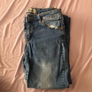 Faded blue jeans from Ross